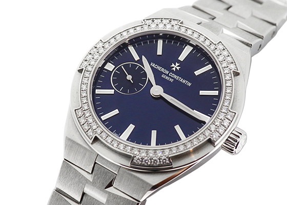 ヴァシュロンコンスタンタン- レディース オーヴァーシーズ スモールモデル ベゼルダイヤ | VACHERON CONSTANTIN | 2305V/100A-B170 | SS ブルー文字盤 自動巻き ブレスレット | 中古 |