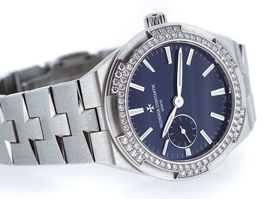 ヴァシュロンコンスタンタン- レディース オーヴァーシーズ スモールモデル ベゼルダイヤ | VACHERON CONSTANTIN | 2305V/100A-B170 | SS ブルー文字盤 自動巻き ブレスレット | 中古 |